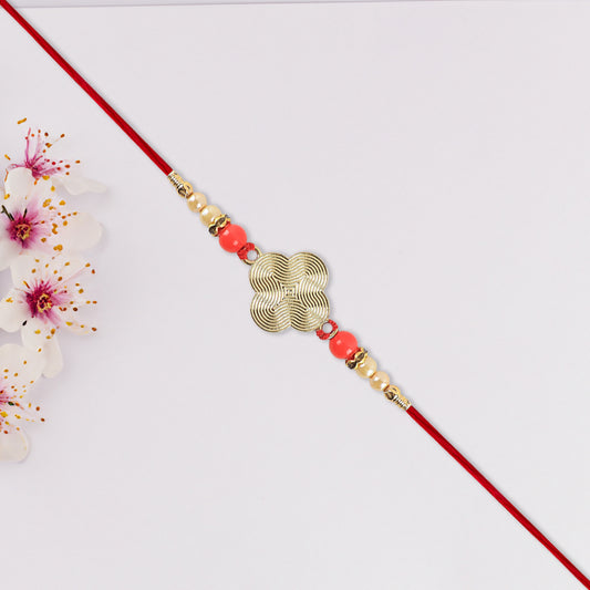 Rakhi With Multicolor Beads Silver Accents On Red Thread